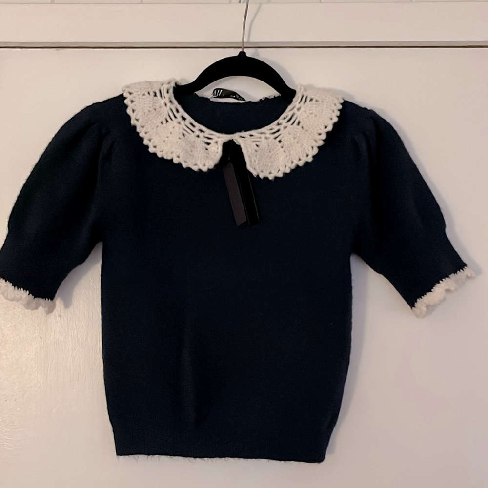 Sweet cozy short sleeve knit. Crochet collar and cuffs, velvet bow. Zara size S